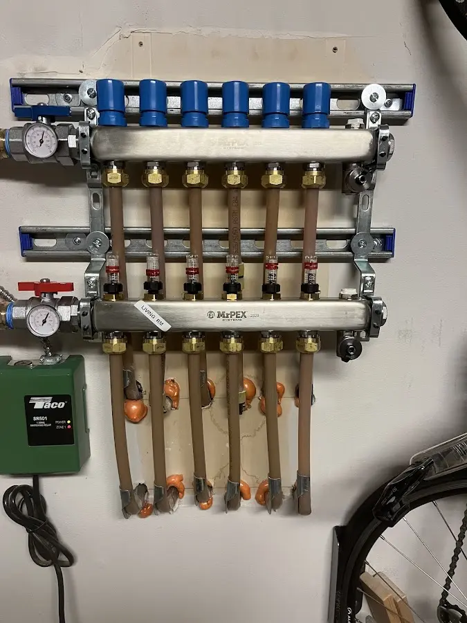 Plumber performing Water Heater Repair at a residential property in Hailey